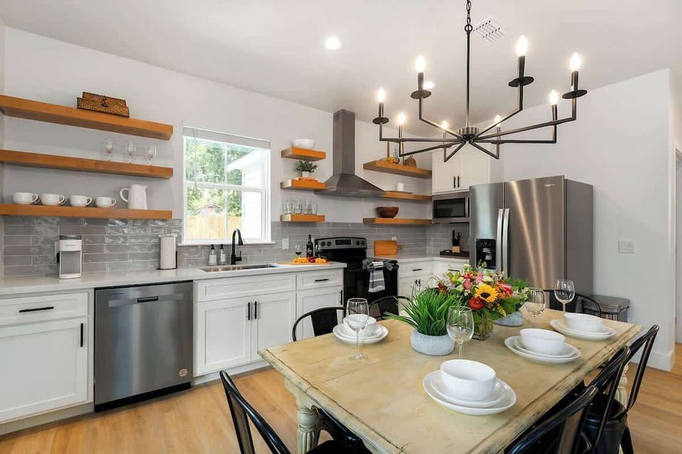 Large table opens to the kitchen to entertain.