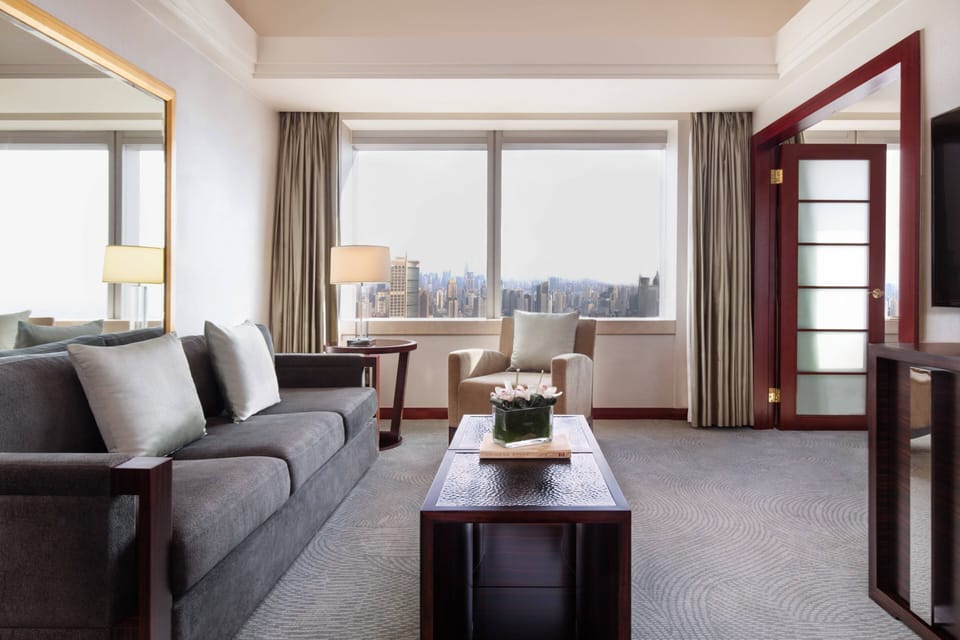 Skyline View Suite (Executive Lounge Access) | Living room | 42-inch flat-screen TV with satellite channels, TV