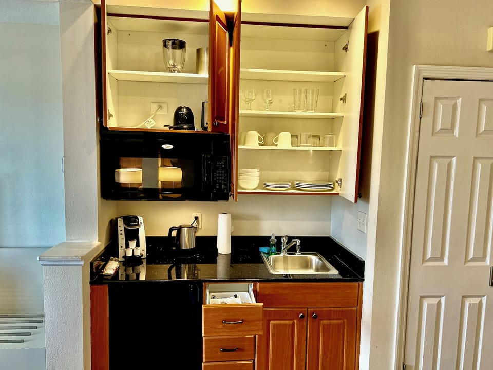 Premium Hotel room, two king beds, kitchenette, Wi-Fi, desk, Full Tile Bath