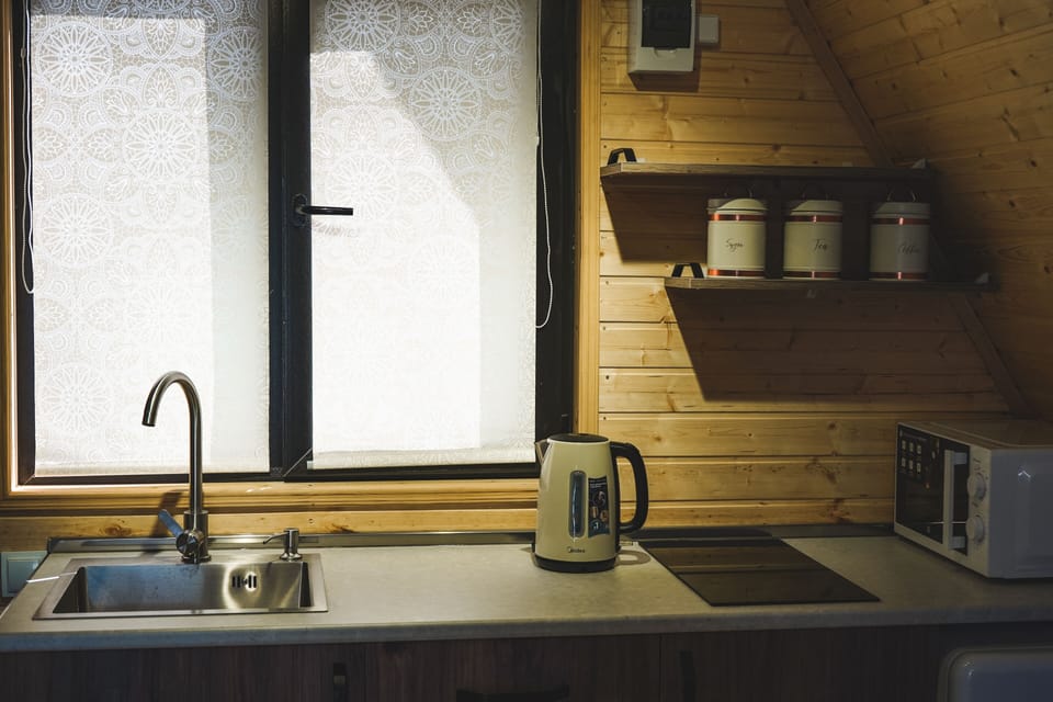 Mini-fridge, microwave, stovetop, electric kettle