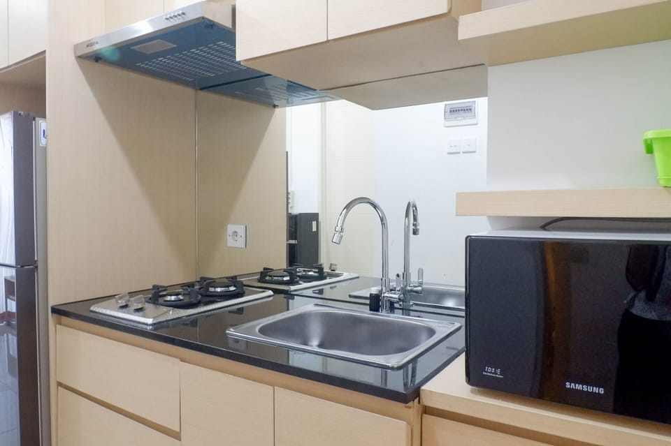 Apartment | Private kitchen | Full-size fridge, stovetop, dining tables