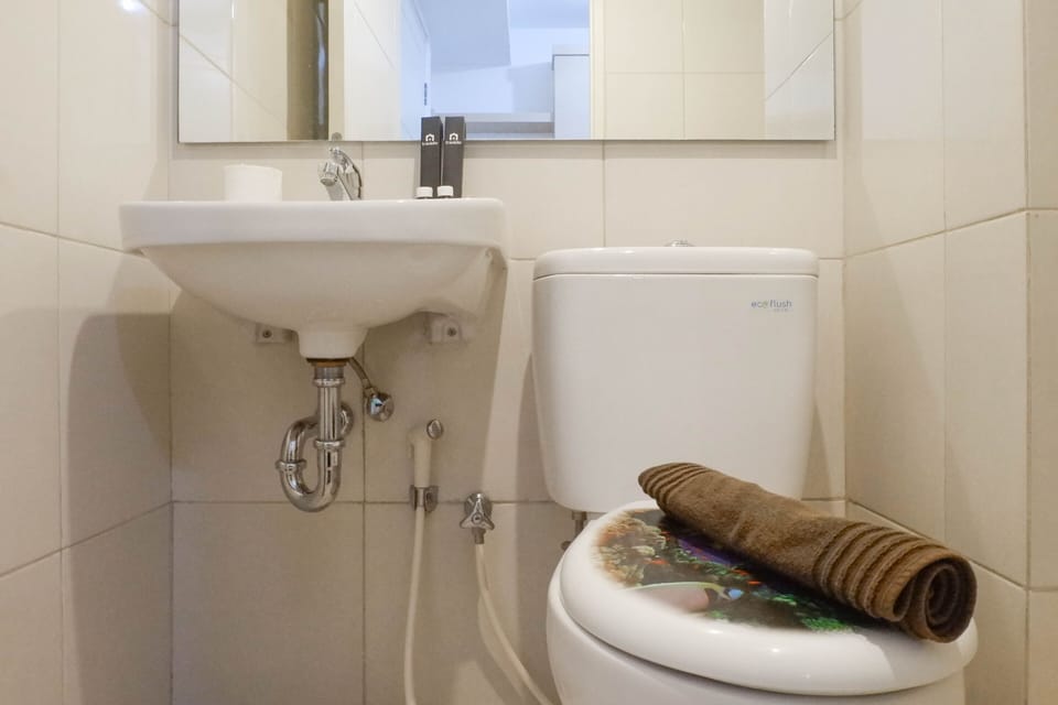 Relaxing And Serene 2Br Apartment At Tanglin Supermall Mansion Apartment in Surabaya