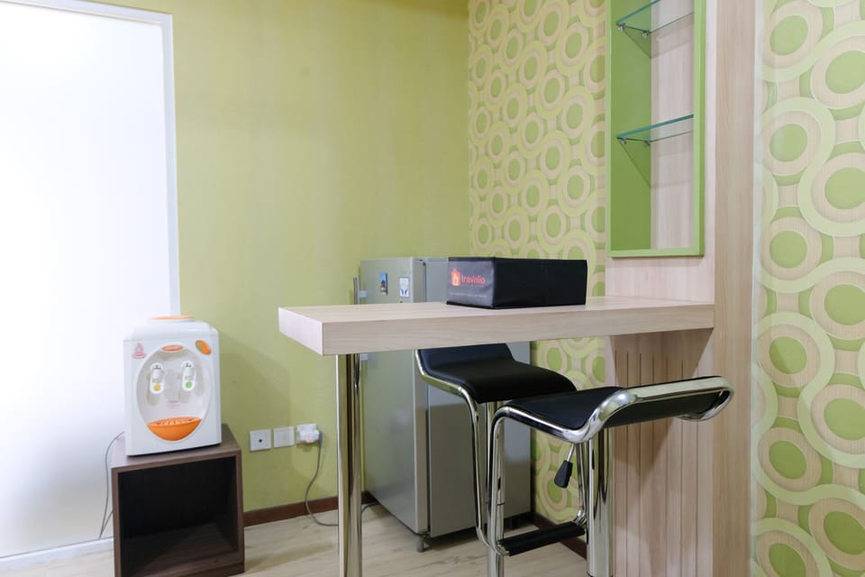 Full-size fridge, stovetop, rice cooker, cookware/dishes/utensils