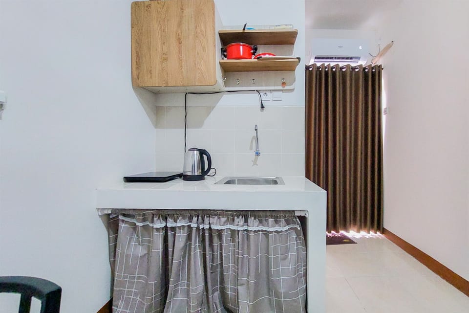 Full-size fridge, stovetop, rice cooker, cookware/dishes/utensils