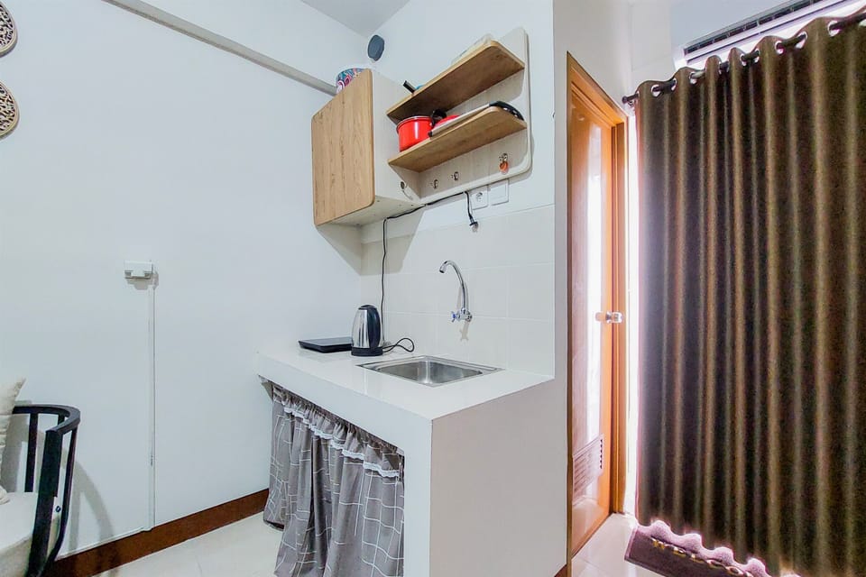 Apartment | Private kitchen | Full-size fridge, stovetop, rice cooker, cookware/dishes/utensils