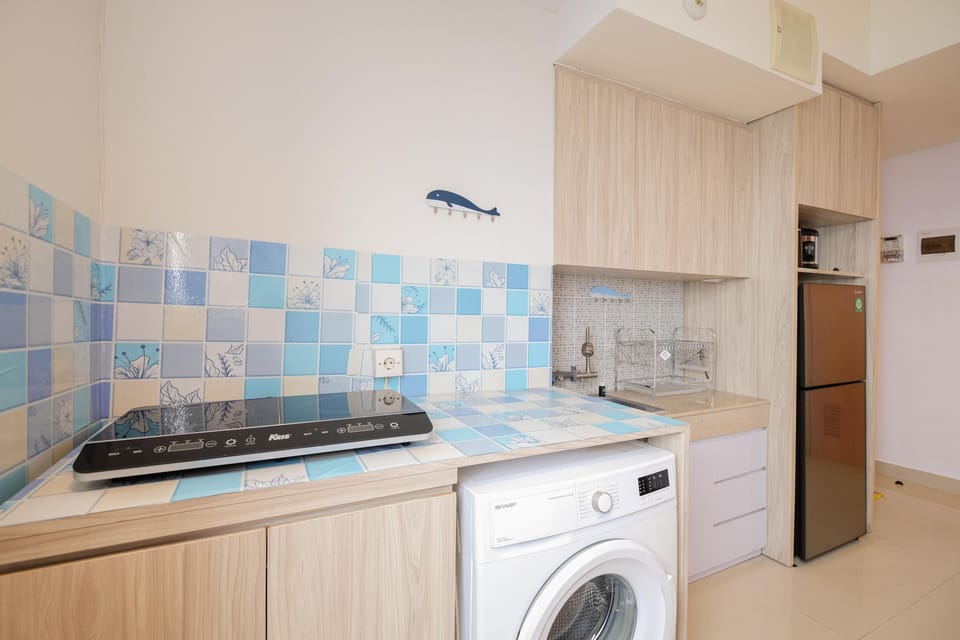 Apartment | Private kitchen | Full-size fridge, stovetop, rice cooker, cookware/dishes/utensils