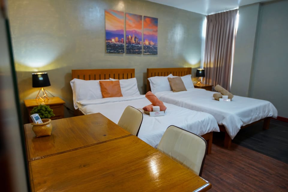Family Room, Multiple Beds, Ensuite | Down comforters, desk, laptop workspace, blackout drapes