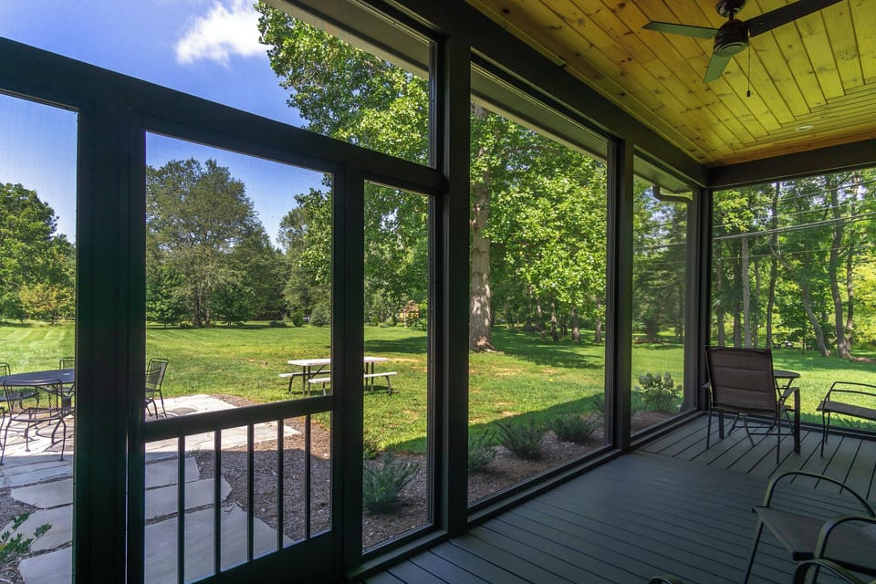 Screened porch off the living room.