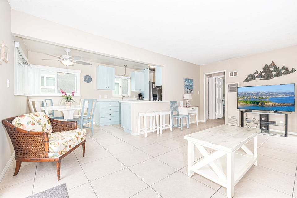 View of spacious living, dining and kitchen areas. The bright and sunny upper unit nicely accommodates a maximum of six guests.
                