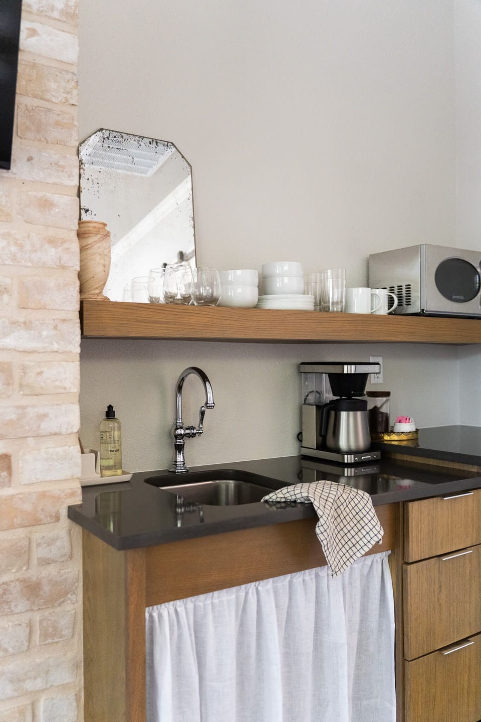 Mini fridge, sink, coffee maker, microwave