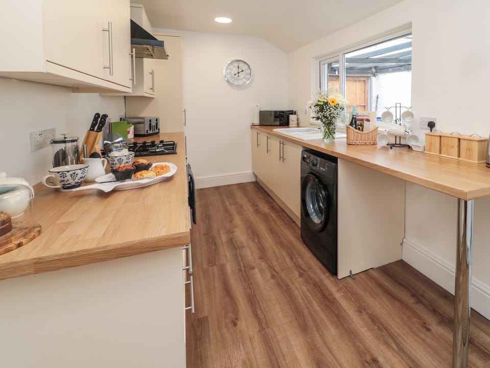 Fridge, electric kettle, toaster, cookware/dishes/utensils