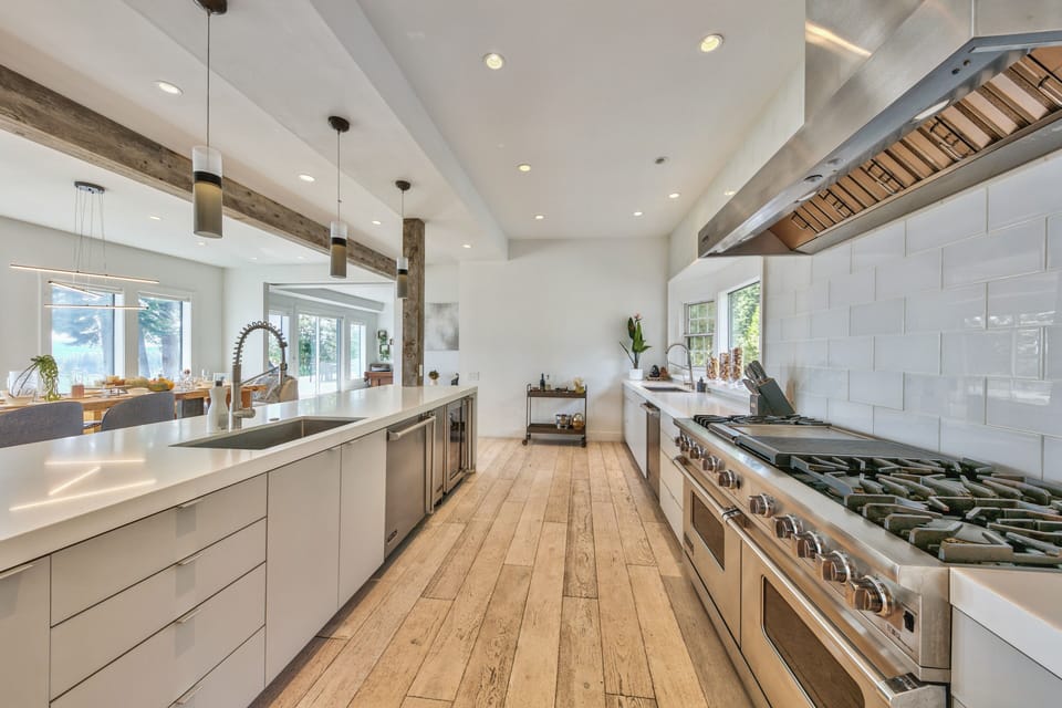 The kitchen with 2 sinks, 2 dishwashers and 2 ovens. There is enough room for all the family cooks.