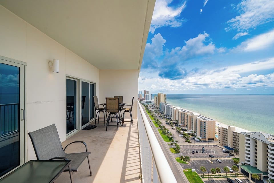 Enjoy the views from the balcony, complete with seating for relaxation and coastal scenery