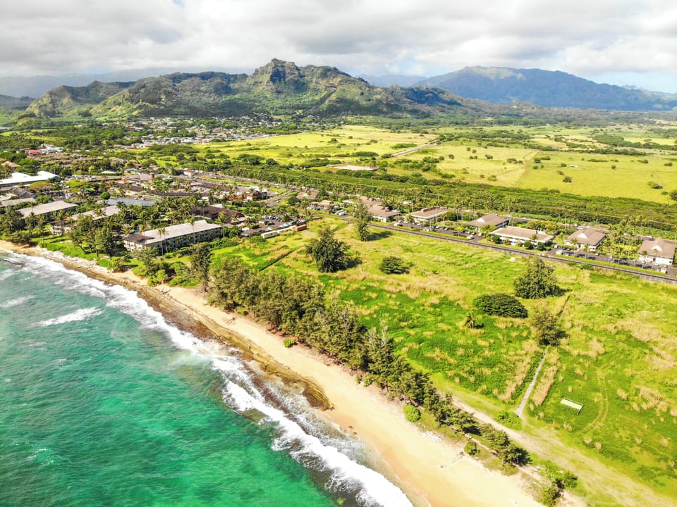 Bask under the Hawaiian sun and dip into turquoise waves—this iconic shoreline is only minutes from your doorstep.