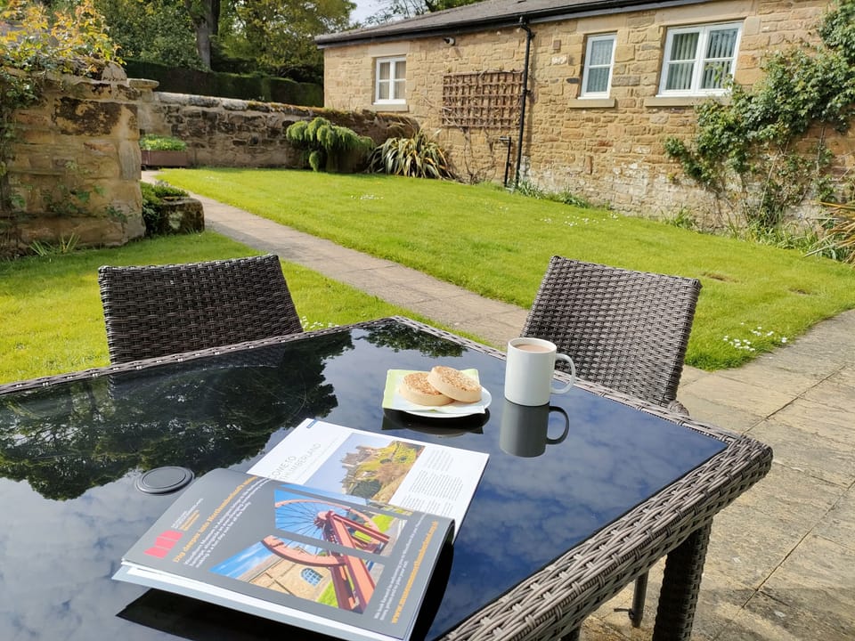 Hastel House - relaxing garden with comfortable outdoor seating and alfresco dining