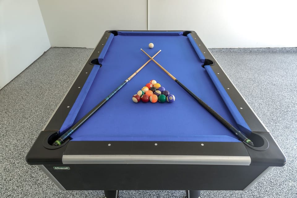 Enjoy a nice game of billiards in our game room