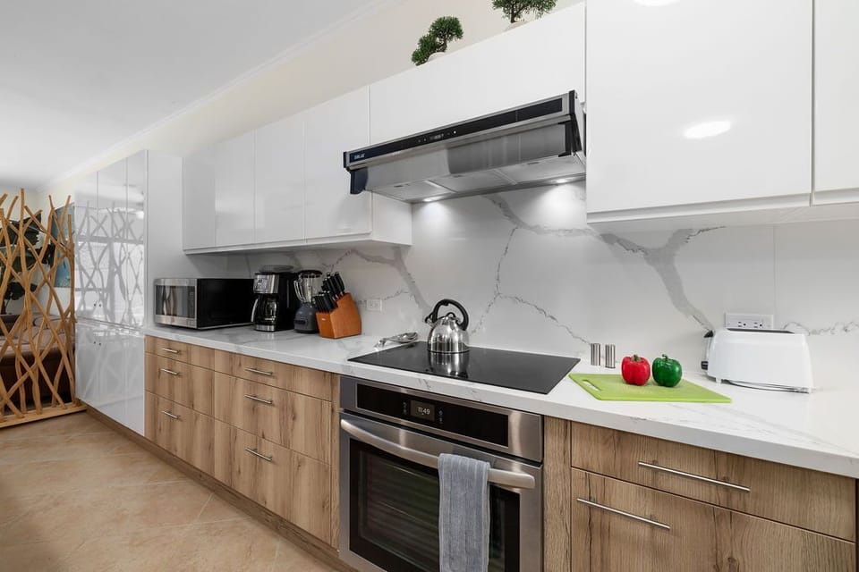 Welcome to the heart of the home! Our fully equipped kitchen offers everything you need to whip up delicious meals, entertain guests, and create lasting memories around the dining table.