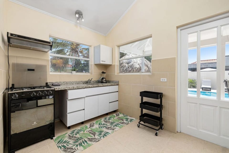 Prepare delectable meals for your family and friends. There is a free-standing stove and a coffee maker in the kitchen.