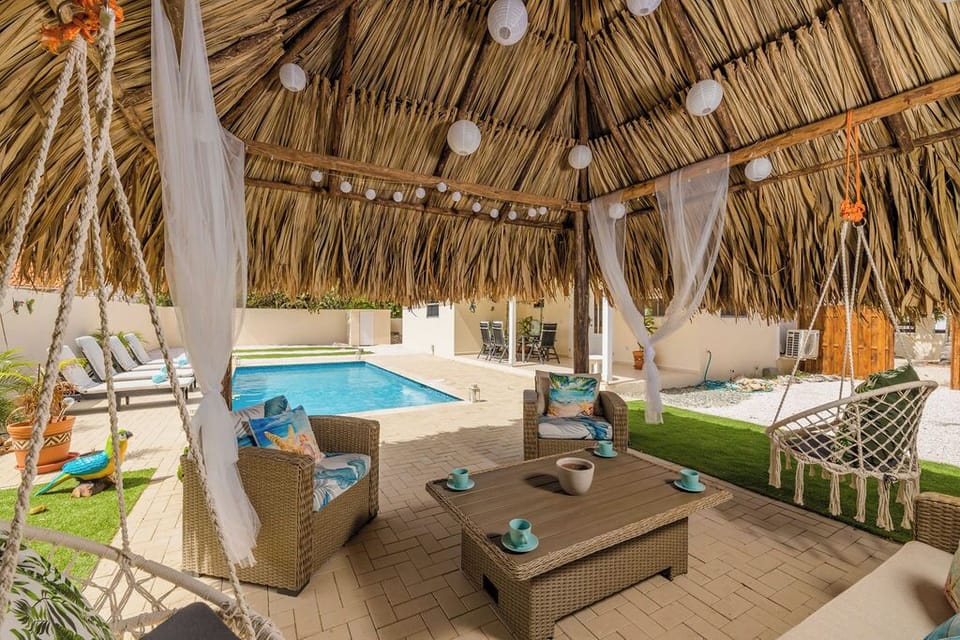 amazing shaded patio and palapa with outdoor dining.