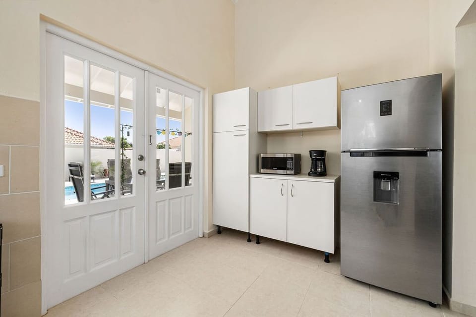 Prepare delectable meals for your family and friends. There is a free-standing stove and a coffee maker in the kitchen.