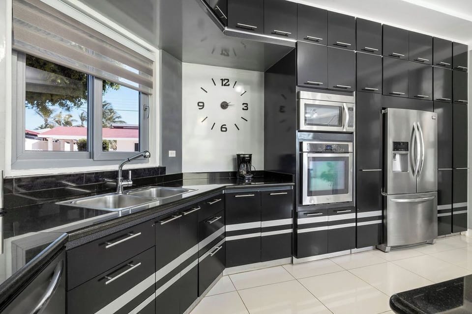 Elevate your stay with the convenience of our fully equipped kitchen – the heart of your culinary journey.