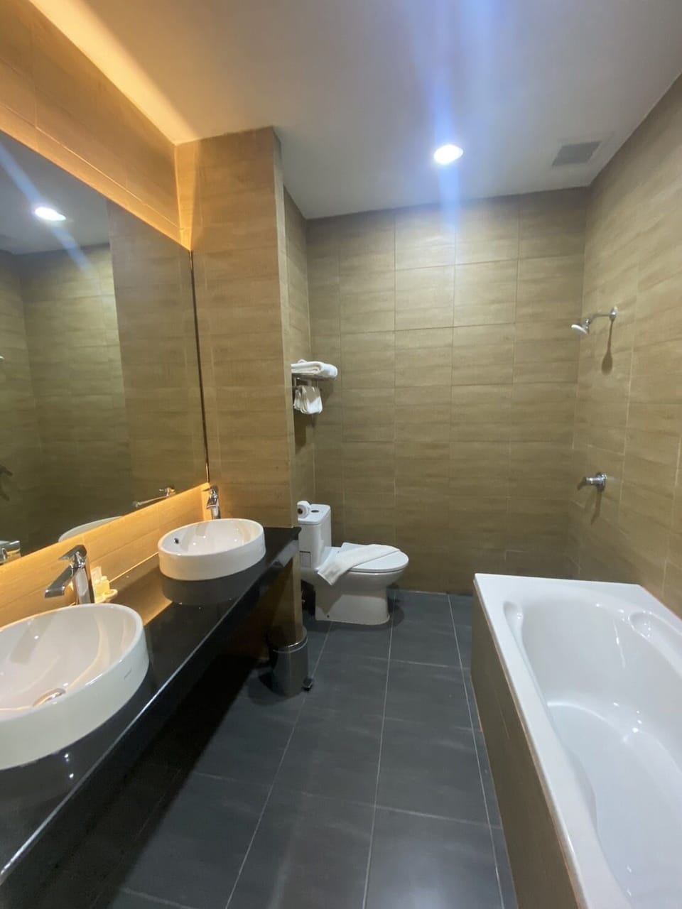 Separate tub and shower, rainfall showerhead, free toiletries