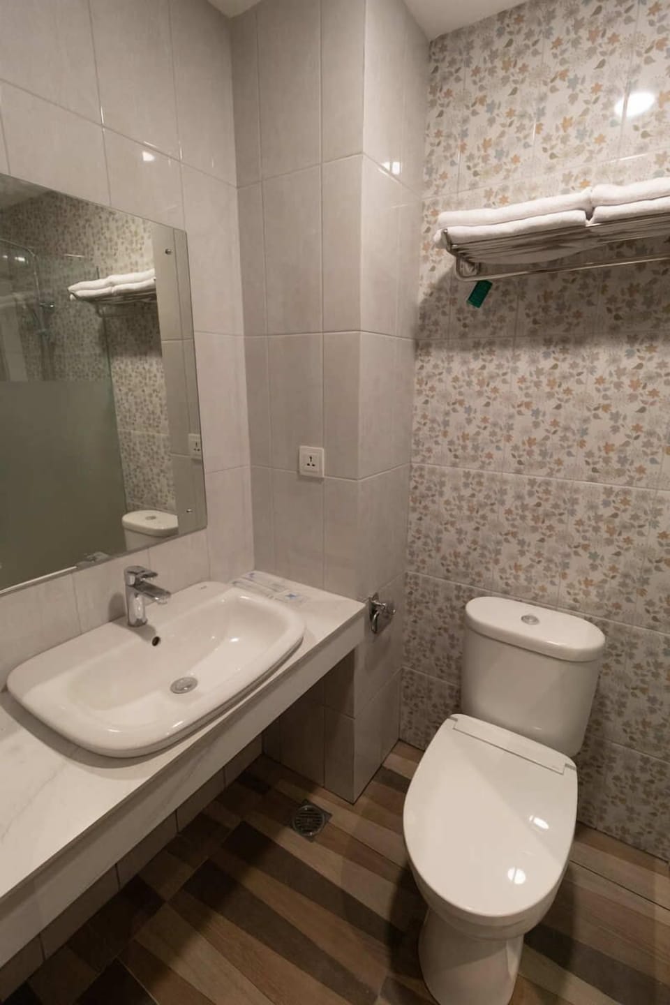 Shower, rainfall showerhead, hair dryer, towels