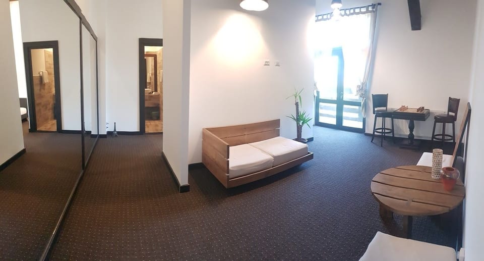 Basic Apartment | Living area | 80-cm LCD TV with digital channels