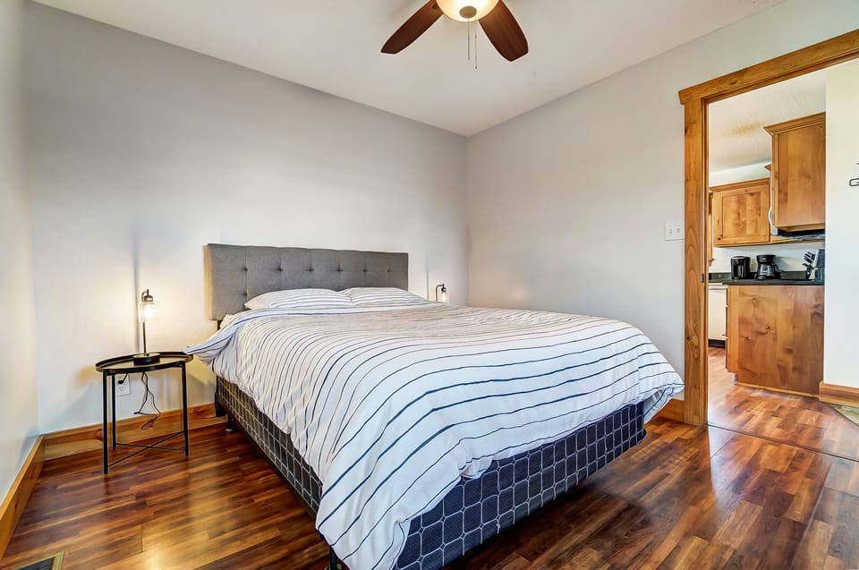 Bedroom 1 is located across from the full bathroom.