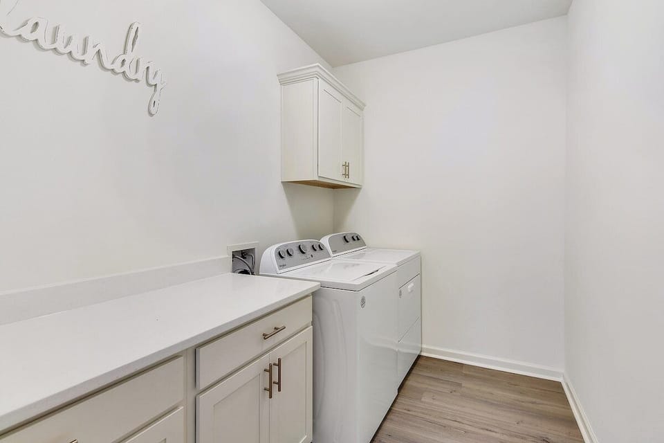 Laundry Room with Washer & Dryer. We also provide Ironing board and Iron.