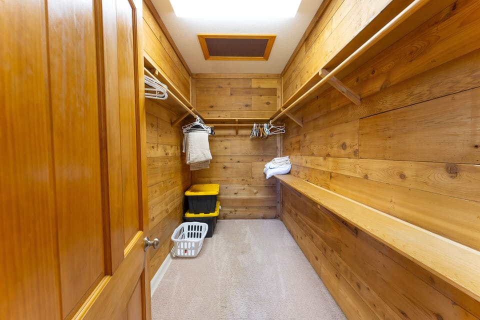 Spacious bedroom walk-in closet.