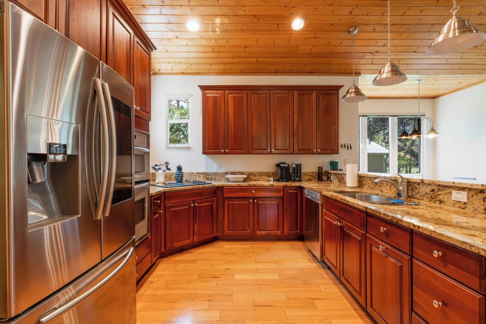 Inside our beautiful kitchen in wooden details and marble counters. 