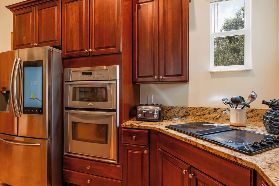 Close up on our kitchen stove and toaster.