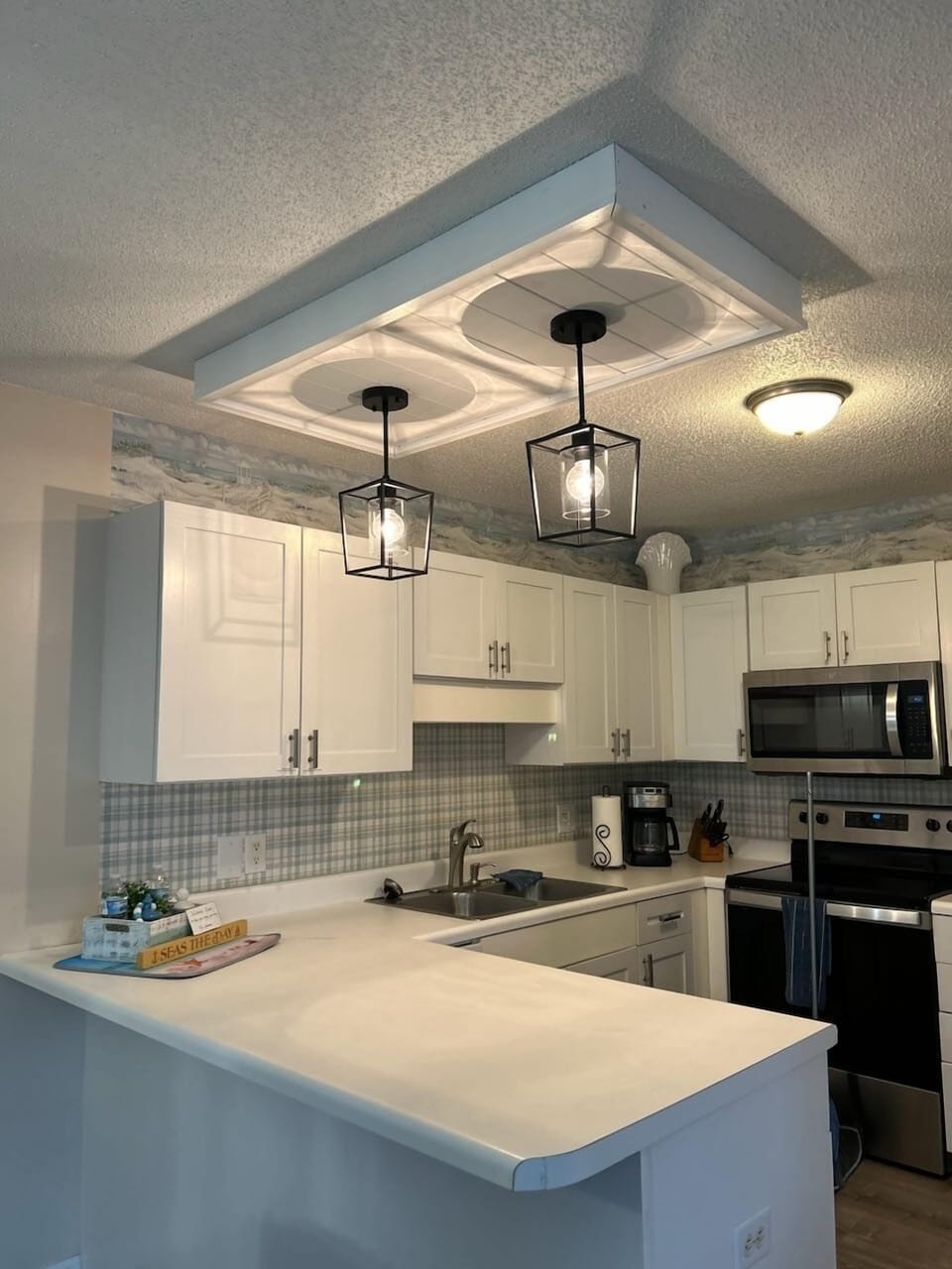 Additional bar seating for 3 leads into our fully stocked kitchen.