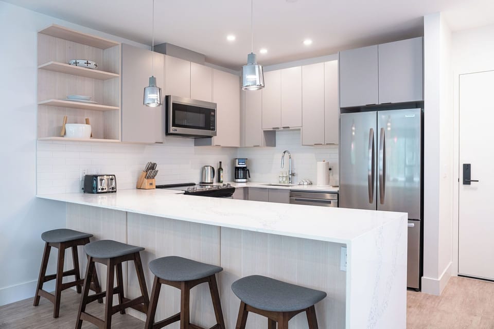 Condo | Private kitchen | Coffee/tea maker, full-size fridge, microwave, oven