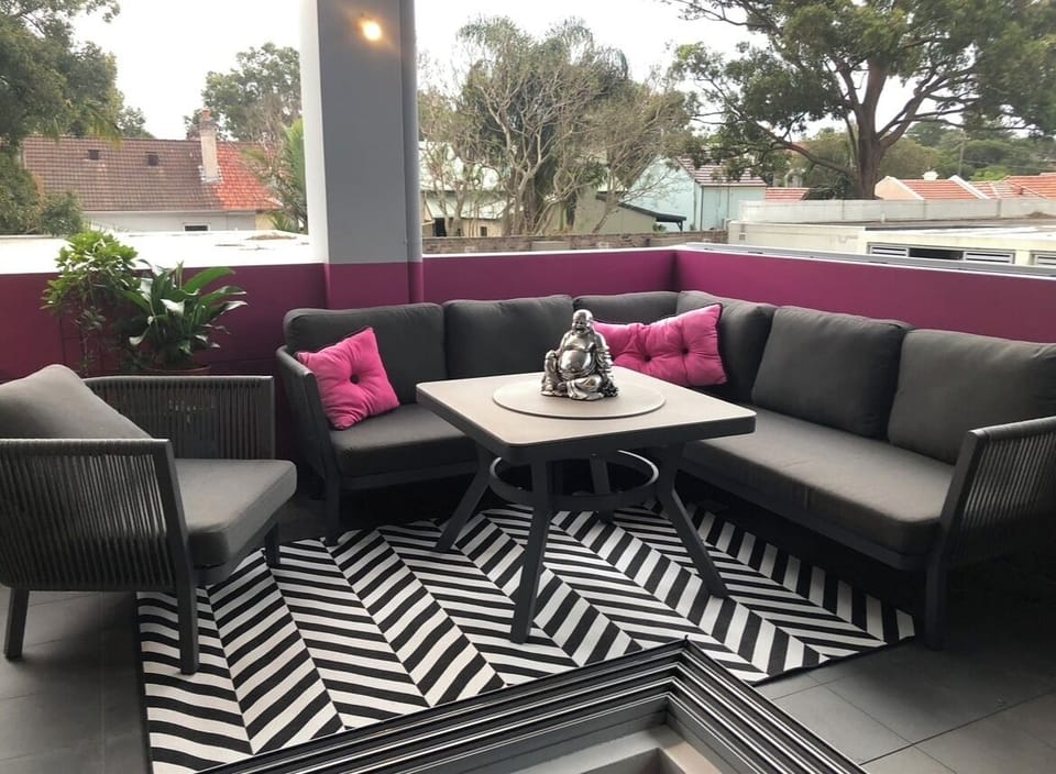 Outdoor Balcony with indoor and outdoor feel to Living and Dining area