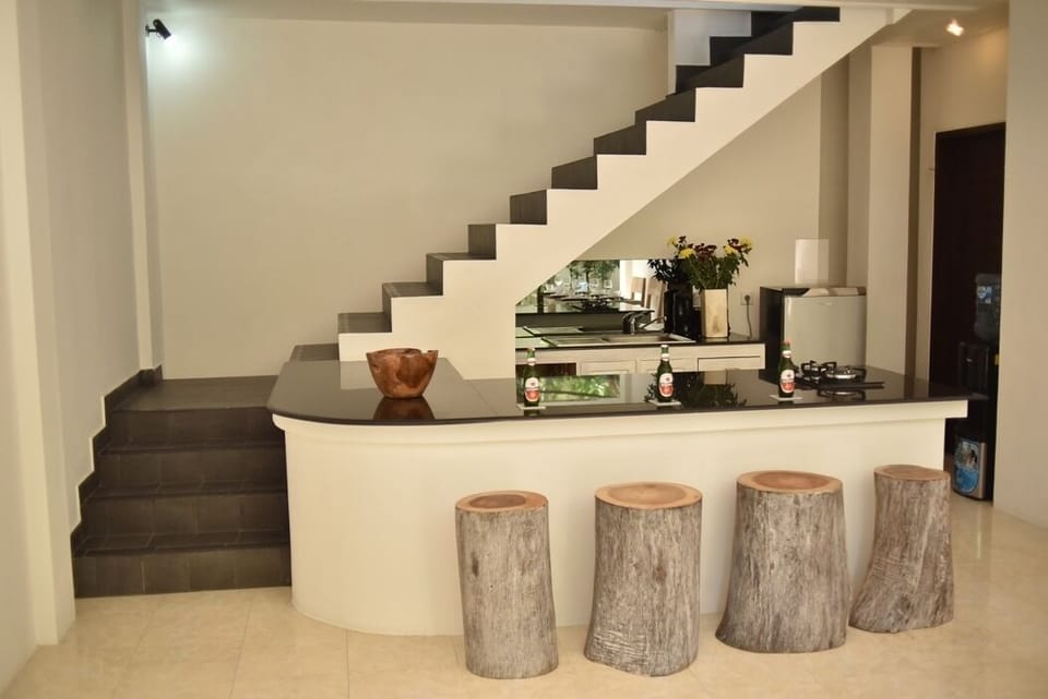 Standard Villa | Private kitchen | Full-size fridge, stovetop, toaster, rice cooker