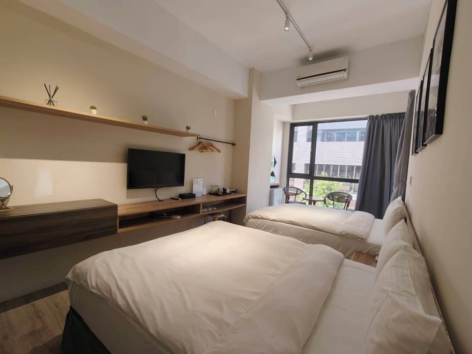 Superior Quadruple Room, Bathtub | Living area | 40-inch flat-screen TV with digital channels