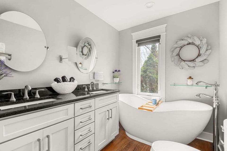 Primary Bathroom with glass shower and soaking tub