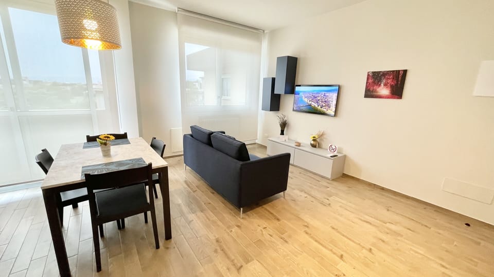 Comfort Apartment, 1 Bedroom, Non Smoking | Living area | 45-inch Smart TV with digital channels
