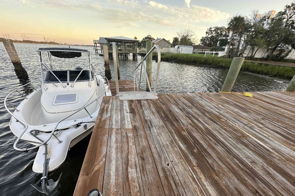 Wonderful short dock has deep water up to 30 feet in the channel for larger boat