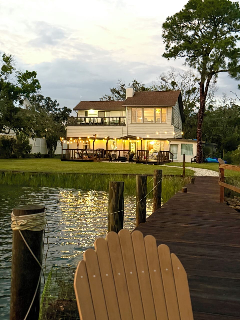 Luxury riverfront retreat with private dock, sunsets & spacious grounds