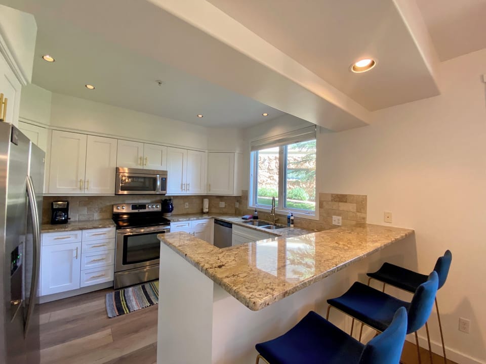 Bar seating at the kitchen counter