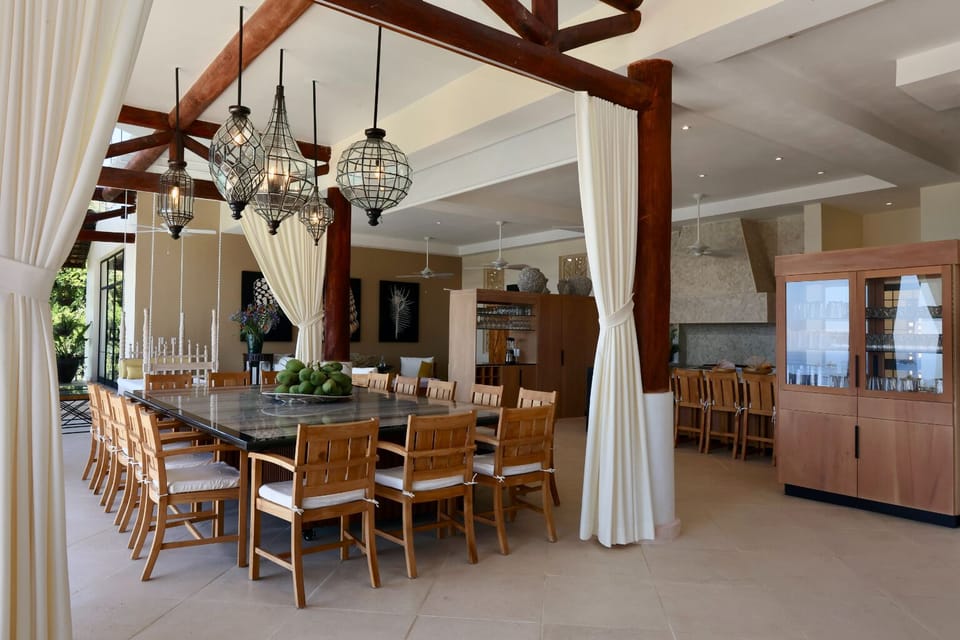 This spacious, elegant custom dining table comfortably seats up to 16 guests.