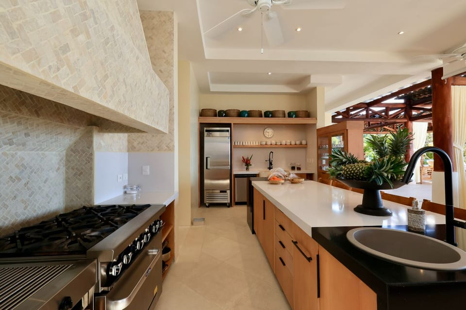 Gourmet kitchen, indoor grill, perfect for memorable meals.