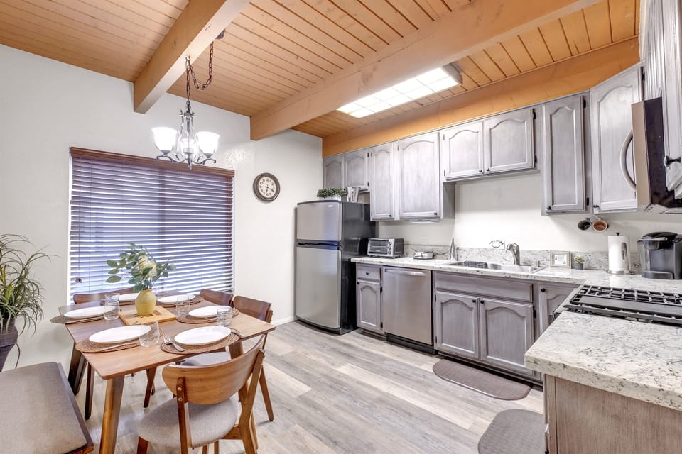 Fully-equipped kitchen with modern appliances and ample storage.