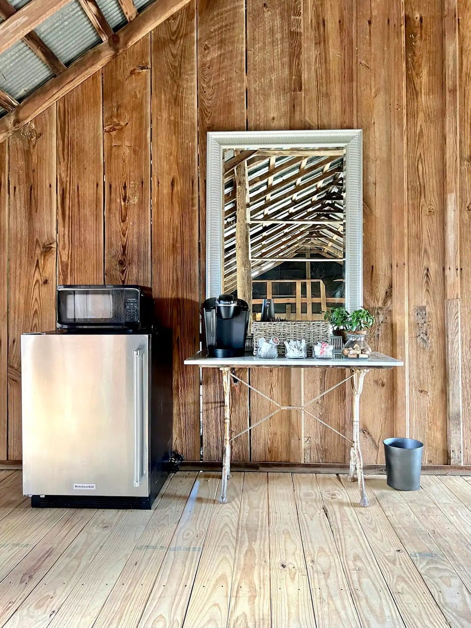 The kitchenette has a Keurig, mini fridge and microwave