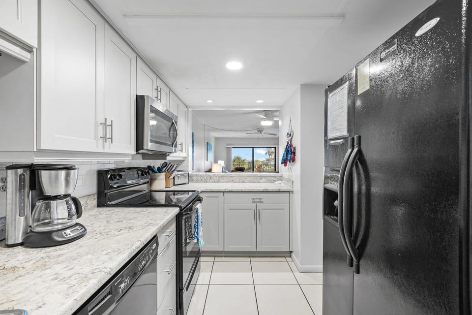 Modern kitchen where you can whip up a meal while still catching glimpses of the ocean.