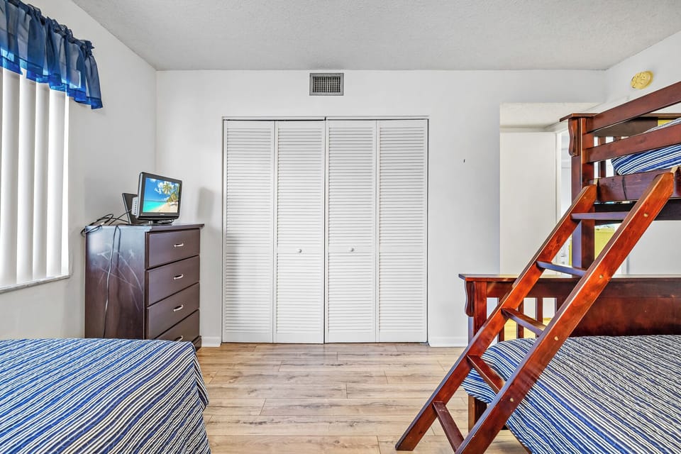 Kid-friendly bedroom featuring bunk beds for a fun and comfortable stay