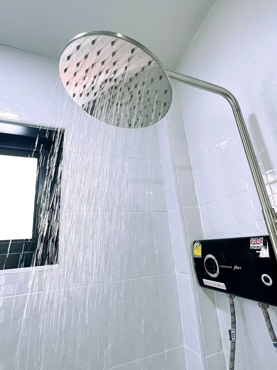 Bathroom | Hydromassage showerhead, free toiletries, hair dryer, bathrobes